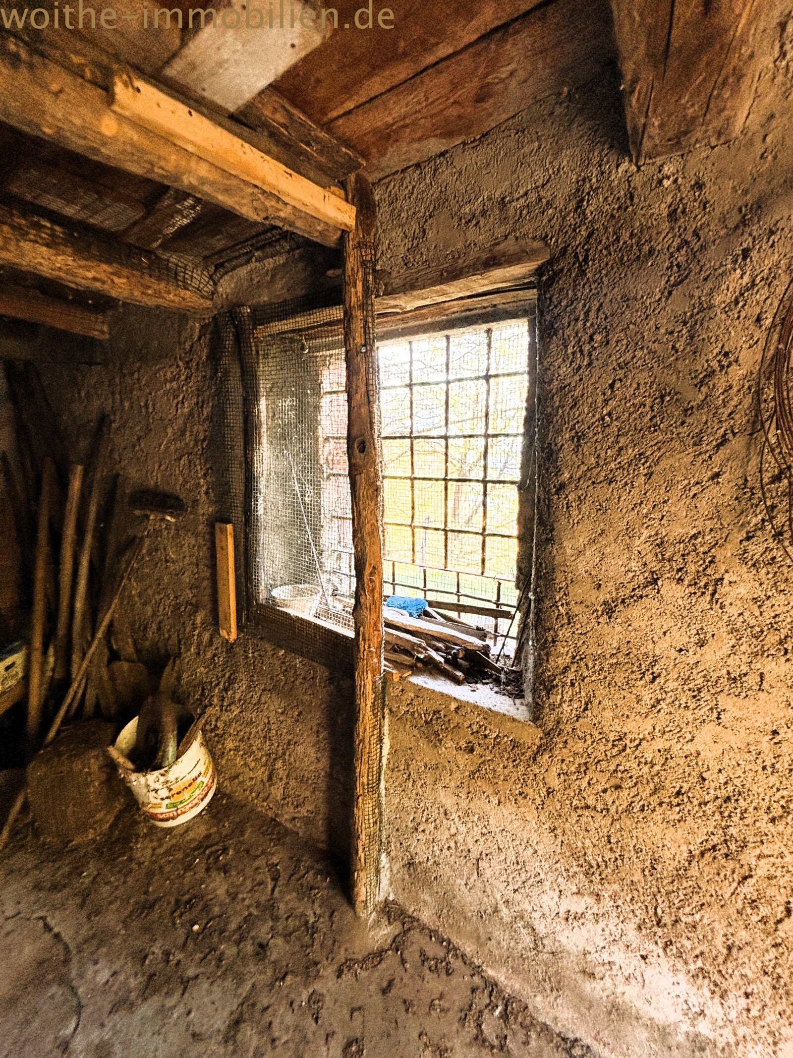 Historic vaulted room with solid stone masonry and rustic wooden beams Historic vaulted room with solid stone masonry and rustic wooden beams